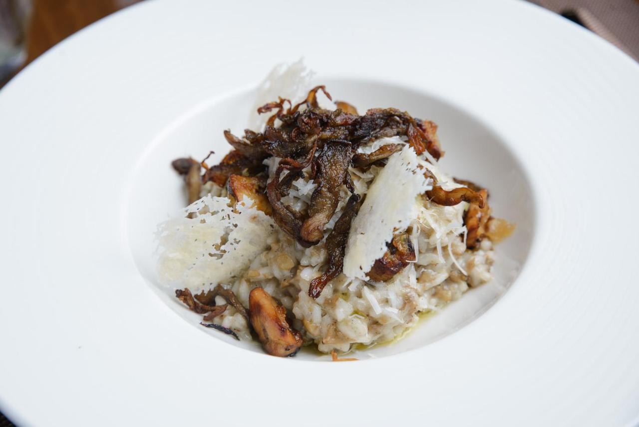 Royal Tulip Hotel & Casino, Тбилиси Экстерьер фото A risotto with black truffle